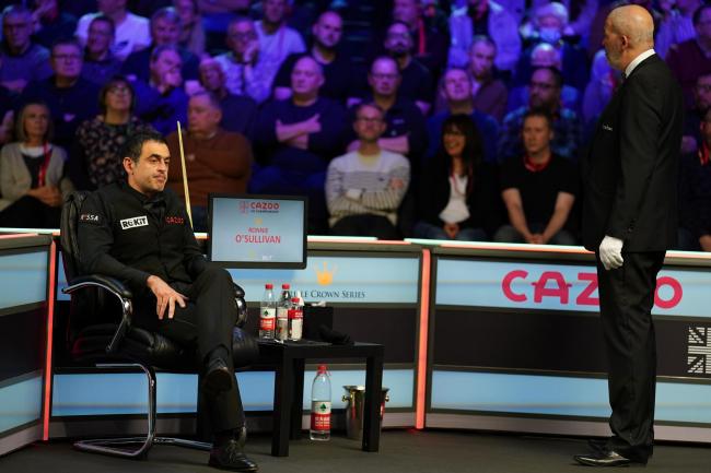 Ronnie O’Sullivan sits back in his chair mid-break as the crowd were leaving their seats during his match with Kyren Wilson at the Cazoo UK Championship at the York Barbican. Picture: Mike Egerton/PA Wire