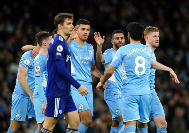 Manchester City's Riyad Mahrez (third right) celebrates scoring their side's fourth goal against Leeds United at the Eithad Stadium. Picture: Martin Rickett/PA Wire