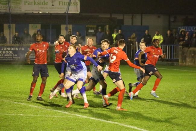 Players jostle in the box under a high ball during York City's 1-0 FA Trophy win at Matlock Town. Picture: Mark Comer