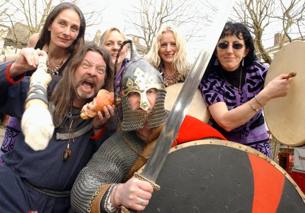York Press: Adrian, front left, taking part in the Viking Festival in York