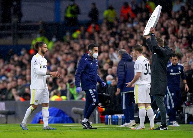 Leeds United's Tyler Roberts (left) leaves the field through injury. Picture: Mike Egerton/PA Wire