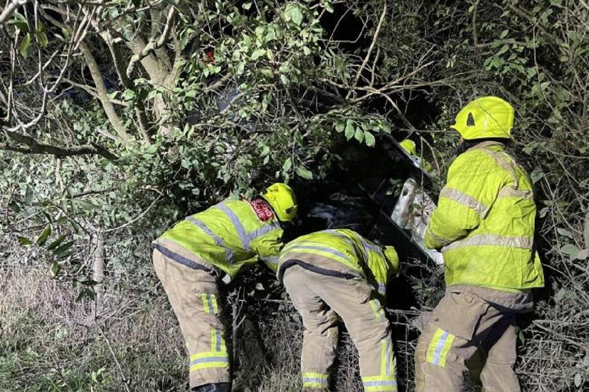 Firefighters rescuing drink driver Lee James Alty on A645  Pic by  Station Manager Tony Walker