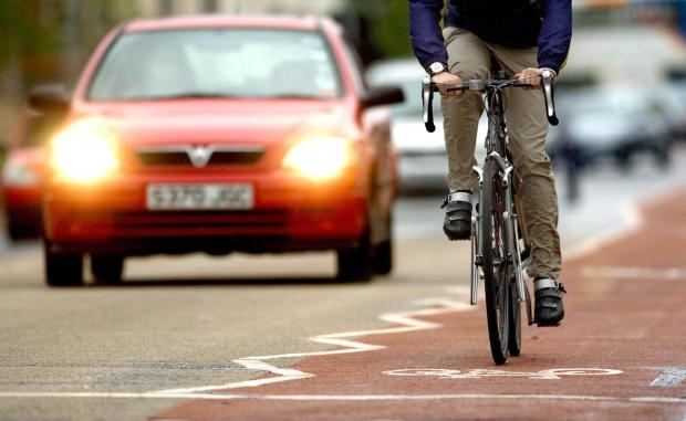 York Press: Photo via PA shows a cyclist on the road near traffic.