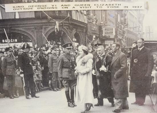 York Press: Burgins in Coney Street - King George VI and Queen Elizabeth pass by during a royal visit in 1937