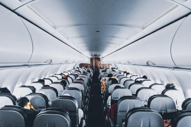 York Press: Rows of empty seats on a plane. Credit: Canva