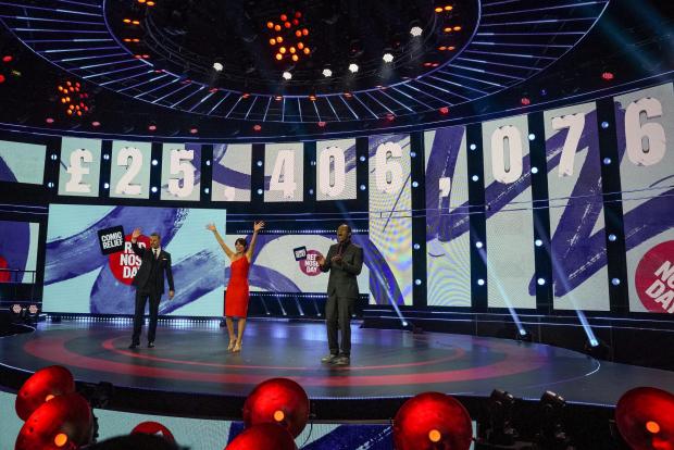 York Press: BBC handout photo of (left to right) Paddy McGuinness, Davina McCall and Lenny Henry presenting Comic Relief 2021. A total of £45,938,942 was raised during the 2021 event. 