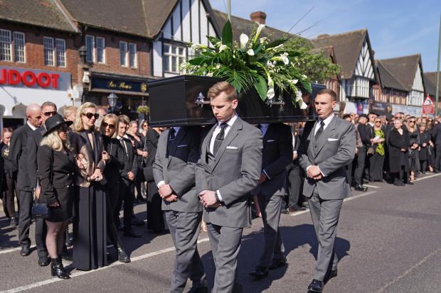 York Press: The coffin of The Wanted star Tom Parker is carried ahead of his funeral. (PA)
