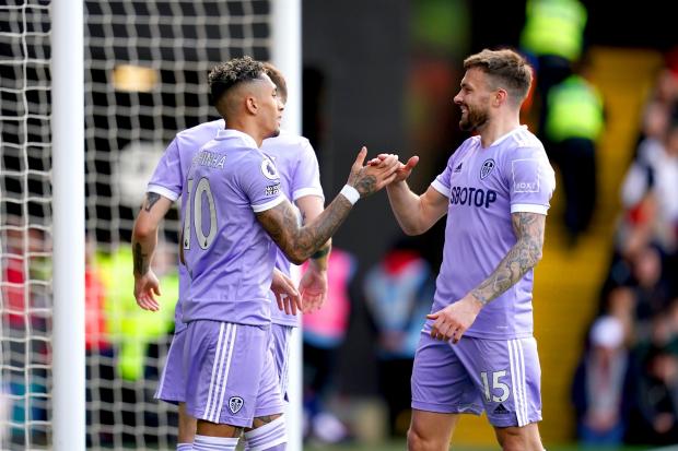 Leeds United's Raphinha is congratulated by team-mate Stuart Dallas after scoring against Watford. Picture: John Walton/PA Wire