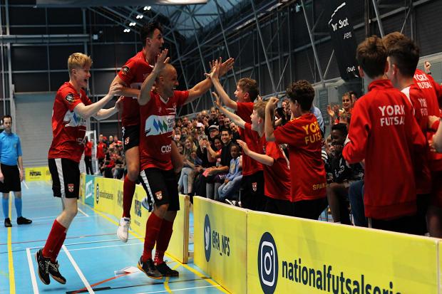 York Futsal and fans celebrate the team’s promotion after a 6-1 victory over Liverpool at the York Sport Arena. Picture: York Futsal