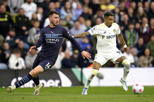 Manchester City's Aymeric Laporte (left) and Leeds United's Raphinha battle for the ball at Elland Road. Picture: Danny Lawson/PA Wire