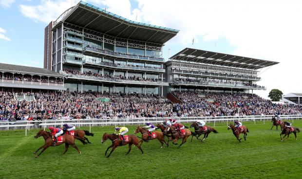 York Press: Duke Of Firenze (left) ridden by jockey David Allan on the way to winning the Betfred ‘Supports Jack Berry House’ Handicap during day two of the 2017 Dante Festival at York Racecourse Picture: Mike Egerton/PA Wire.