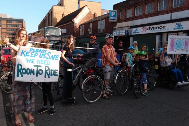 Cycle campaigners and disabled protesters who briefly roped off Piccadilly on Saturday