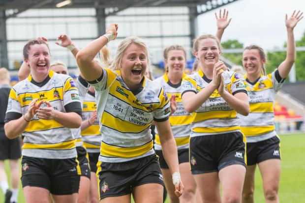 York City Knights Ladies full-back Tara Stanley leads her side's celebrations against St Helens. Picture: Craig Hawkhead
