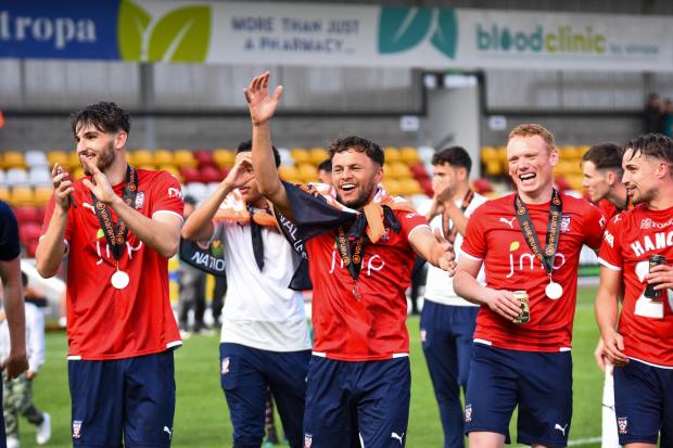 York City forward Kurt Willoughby leads the post-match celebrations after the Vanarama National League North play-off final victory over Boston United. Picture: Tom Poole