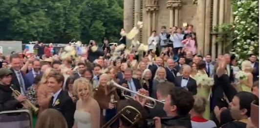 York Press: Pixie Lott with York Brass Band at her wedding Picture: SWNS video
