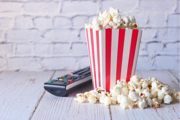 York Press: Popcorn and a TV remote (Canva)