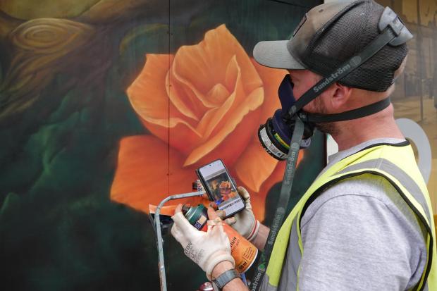 The former Debenhams in Oxford Street, Harrogate, is being transformed by a street artist