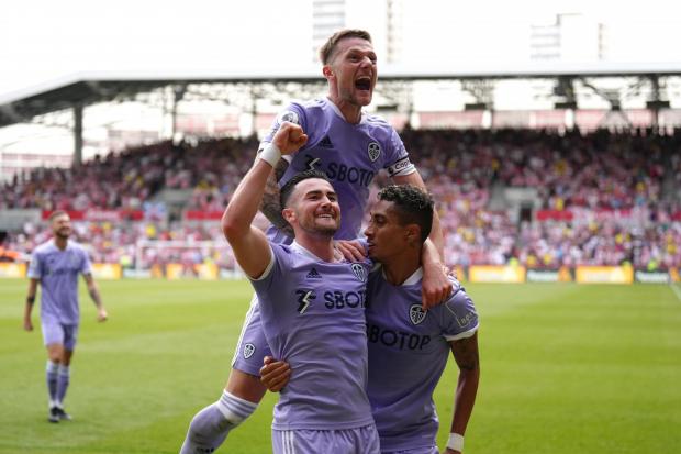 Leeds United's Jack Harrison (left) celebrates with team-mates Raphinha (right) and Liam Cooper. Picture: John Walton/PA Wire