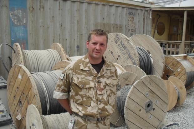A JOB TO DO: Sergeant David Tu rnbull, 31, who has been in Kandahar for three weeks