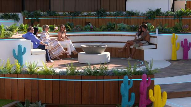 York Press: Gemma and Luca at the fire pit with their families. Love Island continues tonight at 9pm on ITV2 and ITV Hub. Episodes are available the following morning on BritBox. Credit: ITV