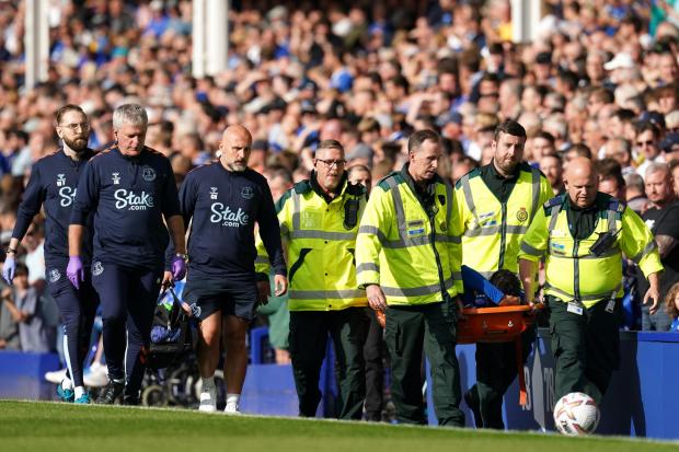 Everton defender Ben Godfrey is removed from the pitch after picking up an injury against Chelsea at Goodison Park. Picture: Nick Potts/PA Wire