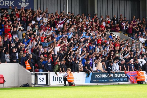 York City fans in the LNER Community Stadium's South Stand made their voices heard in Saturday's 2-0 win over Woking. Picture: Adam Davy