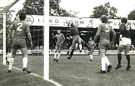 23/09/72: York City 0, Oldham 0 - Oldham 'keeper Harry Dowd clears a high centre, with City's Crangle and Seal challenging.