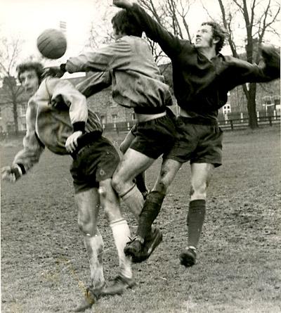 20/01/71: Hillyard punching clear a centre challenged by Aimson and McMahon