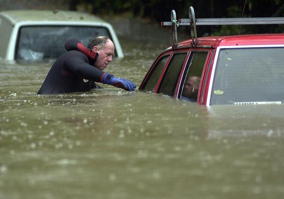 November 2000 York area floods. A diver searches parked vehicles