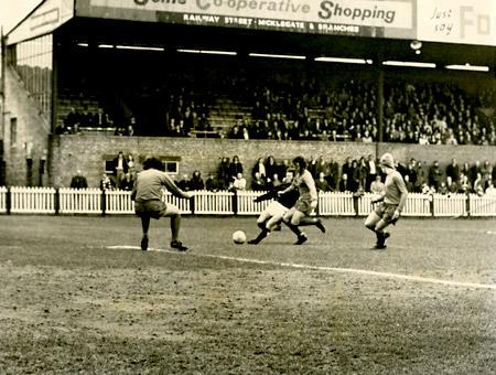 17/03/73: York City 3, Scunthorpe 1 - City's Brian Pollard gets his shot past Scunthorpe 'keeper Williams, despite being tackled by Barker, to score his side's first goal.
