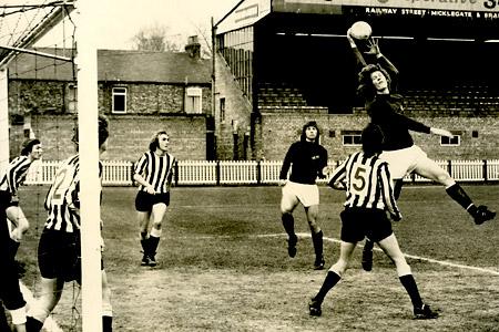 24/03/73 - Newscastle Inters' goalkeeper Bell makes a fine save to snatch the ball from the head of an attacking York forward, during a game against York City Inters at Bootham Crescent.