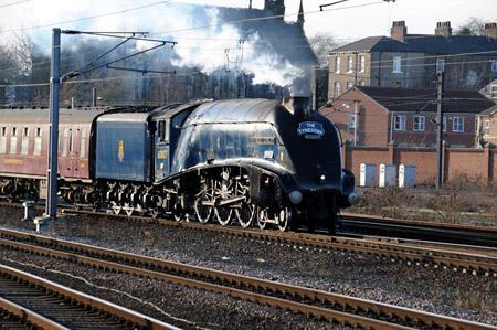 A4 Sir Nigel Gresley powers into York with St. Paul's Church in the background. Picture: Malcolm Tomlinson