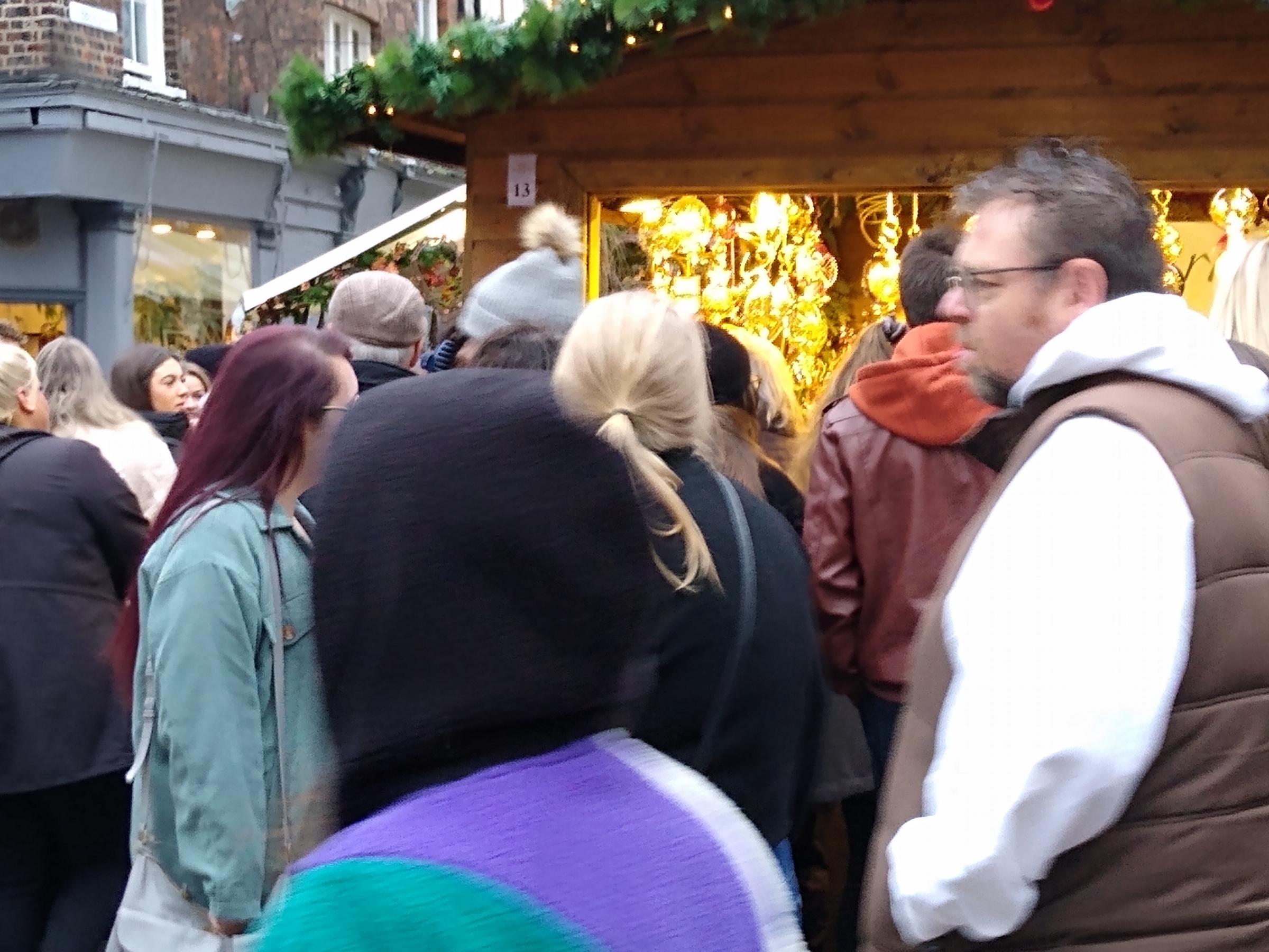 The crush round the mulled cider and festive drinks stand in Parliament Street. Pic by Megi Rychlikova