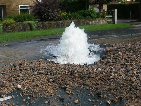 A burst pipe in a residential street in Bramham. Picture: Hannah Allenby