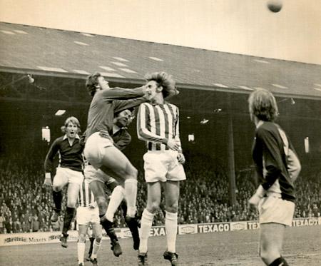 16/04/74: York City 1, Huddersfield 0 - Keeper Dick Taylor punches to clear a corner.