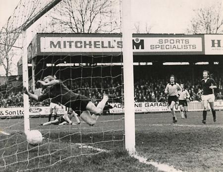 24/02/74 - York City 2, Cambridge United 0: Goalkeeper Vasper changes direction, but fails to stop a centre from Jimmy Seal, which Allan Guild deflected into the net.