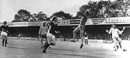 29/09/73: York City 3, Aldershot 1 - Seal is again in action as he challenges Godfrey for a high cross in the goalmouth.