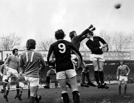 21/11/73 - York City 0, Manchester City 0 (League Cup) - Barry Swallow caught between a double fisted clearance from 'keeper McCrea