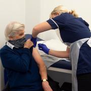 Laura Atherton from Haxby Group administers the vaccine to John Catchpole.   Pictures: ©Darren Casey