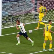 Harry Kane celebrates the first of his two goals against Ukraine. Picture: PA.