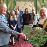 David Fotheringham, president of York Rotary Club, hands a book containing the 1,250 babies’ names to the Lord Mayor of York, Cllr Chris Cullwick, in a ceremony at the Mansion House, with partners in the tree planting venture pictured in the