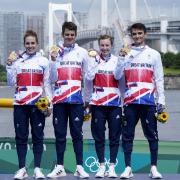 Tadcaster's Team GB medalist Jessica Learmonth (far left) alongside team-mates Jonathan Brownlee, Georgia Taylor-Brown and Alex Yee on the podium with their gold medals in Tokyo. Picture: Danny Lawson/PA Wire