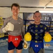 York professional boxer Will Harrison (left) alongside former world champion Josh Warrington (right).