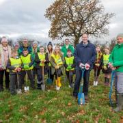 Cllr Keith Aspden with Forestry England staff including Alan Eves, Jim Lee and Beth Cambridge, with pupils and staff from Poppleton Ousebank Primary, and York Community Woodland council officers.