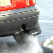 Air pollution from a car's exhaust pipe. Photo via Isle of Wight County Press.