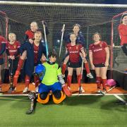 City of York Hockey Club Girls Under-12s pose in front of the posts after their match in the England Hockey Cup Regional Finals