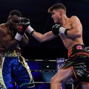 York boxing prospect George Davey lands a right uppercut on Serge Ambomo. Picture: Stephen Dunkley/Queensbury Promotions