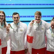 England's Freya Anderson James Guy, James Wilby and Lauren Cox after winning bronze in the mixed 4x100m medley relay final in the 2022 Birmingham Commonwealth Games. Picture: Zac Goodwin/PA Wire