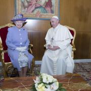 The late Queen Elizabeth II with Pope Francis.