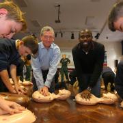 Yorkshire Ambulance Service is holding lessons on Restart a Heart Day in York and North Yorkshire schools. Pictured is former footballer Fabrice Muamba teaching CPR to pupils at Fulford School in York back in 2017